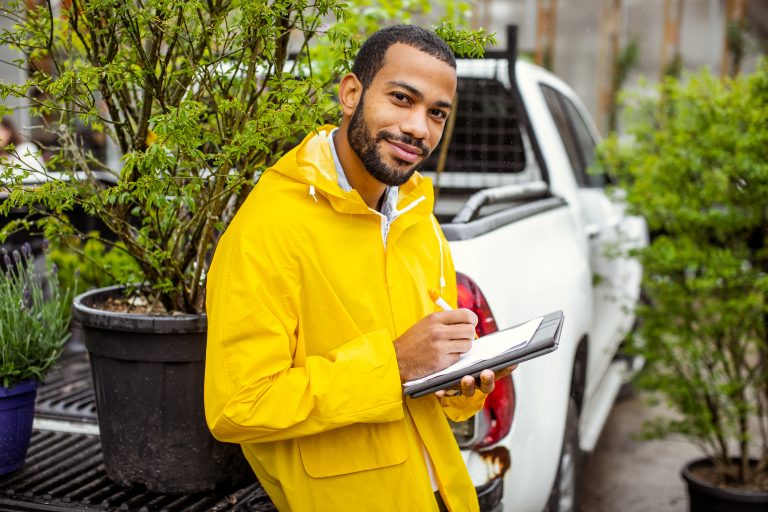 Garden center worker transporting plants commercial auto insurance